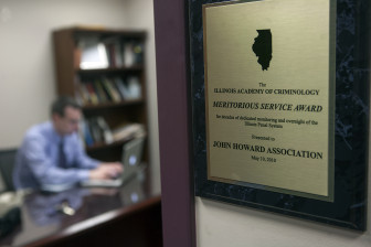 A plaque inside the offices of the John Howard Association of Illinois.