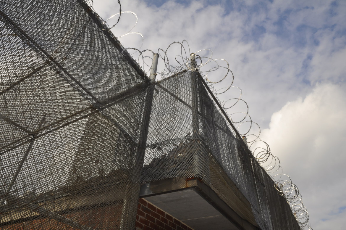 Barbed wire around juvenile detention center