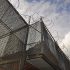 Barbed wire around juvenile detention center