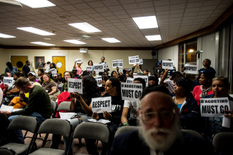 April 9, 2013, Spring Valley, NY, USA: Students, parents, and activists protest at the  school board meeting discussing the budget for the 2013-2014 school year. 