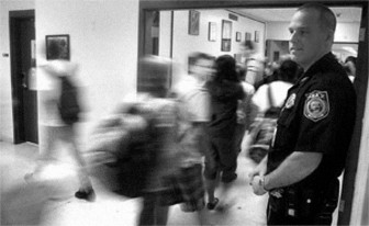 Police Officer and Cortland City School Resource Officer, Rob Reyngoudt. Cortland, New York. 