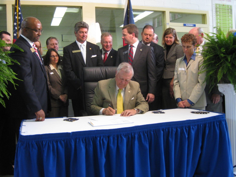 Gov. Nathan Deal signs a much-anticipated juvenile justice reform bill into law Thursday.