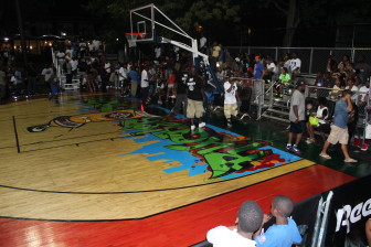 Security guards clear the Rucker Park court following the Sean Bell All-Stars’ 87-82 victory over the Bingo All-Stars in the championship game of the first annual Trayvon Martin Invitational. The EBC invited the top eight street balls in NYC from the most highly touted pro-am leagues such as Hoops in the Sun and Nike Post City, among others.