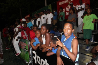 Children from the neighboring Polo Grounds Towers complex take in the game with friends at Rucker Park. It was the “first time in many years” where the EBC and Rucker Park allowed access for children ages five and under, according to EBC CEO Greg Marius. 