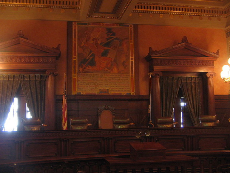 Five of seven judges seats in the Supreme Court chamber in the Pennsylvania State Capitol in Harrisburg, Pa. 