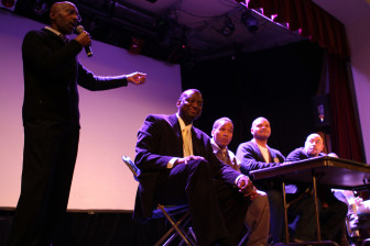 The Central Park Five at the Dempsey in Nov. 2012. Central Park Five civil case lawyer on the microphone. Seated left to right: Members of the Central Park Five - Yusef Salaam, Korey Wise, Kevin Richardson, and Raymond Santana.