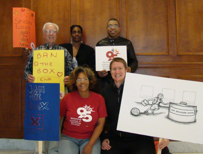 Marilynn Winn (left front) and other supporters of the Ban the Box campaign at a press conference. The city of Atlanta took an administrative action in January 2013 to remove the question about criminal background from the city's employment applications. 