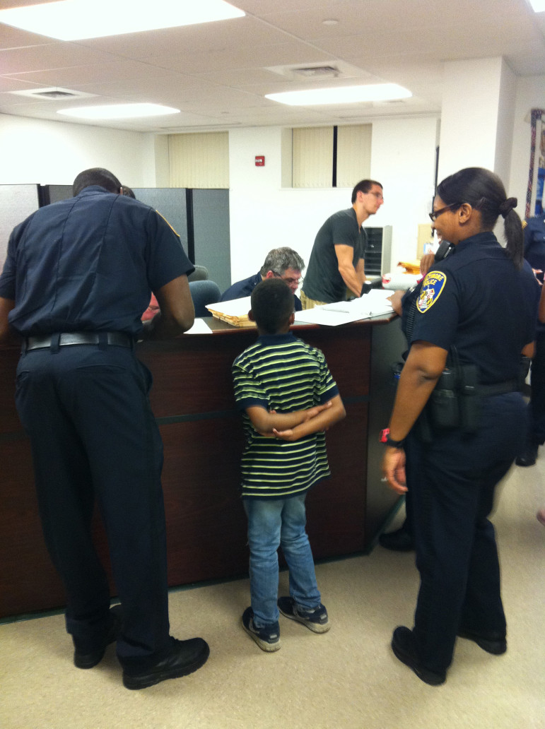 An 8-year-old boy found wandering the streets is sent to the Baltimore curfew center in Baltimore, Maryland. (Justin Fenton/Baltimore Sun/MCT)