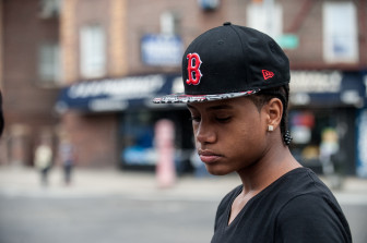 Yoseluis Montero, a friend of Javier Payne, speaks outside MS 22 in the Bronx.