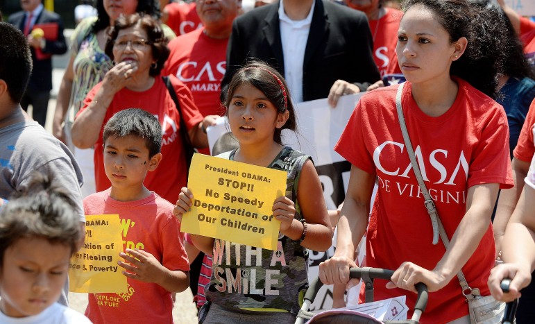 Immigration activists protest youth deportation.