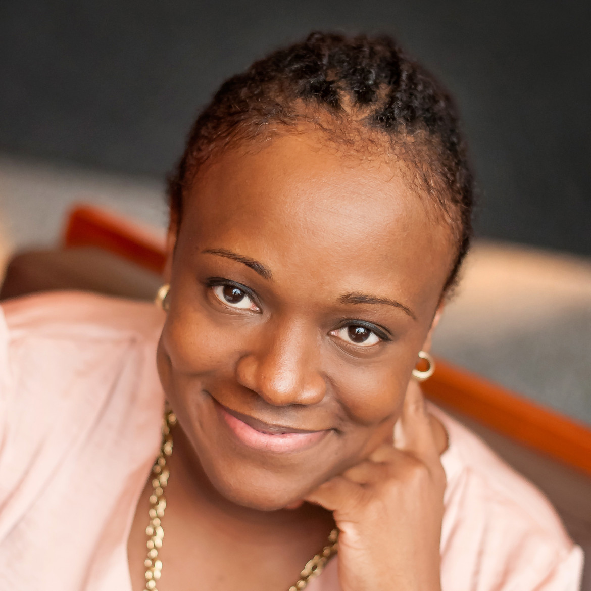  electronic monitoring: Marie Williams (headshot), senior program officer at the Stoneleigh Foundation, smiling woman with necklace, earrings, pink top