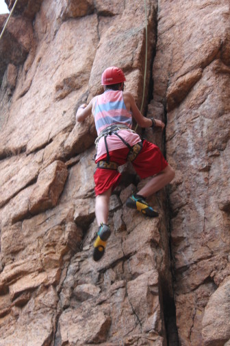 a participant in Phoenix Multisport’s “Together Families Recover” program during a climbing event at Bear Trap Ranch near Colorado Springs, Colo.
