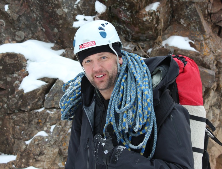 Scott Strode, founder of Phoenix Multisport, ice climbing in Ouray, Colo.