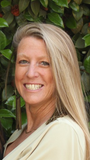 ACEs: Kathleen Van Antwerp (headshot), executive director of Ventura County Child Abuse Prevention Council, smiling woman with long blond hair, long earrings, white top.
