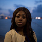 Myra Richardson (portrait), Mississippi River in background, Baton Rouge teen activist