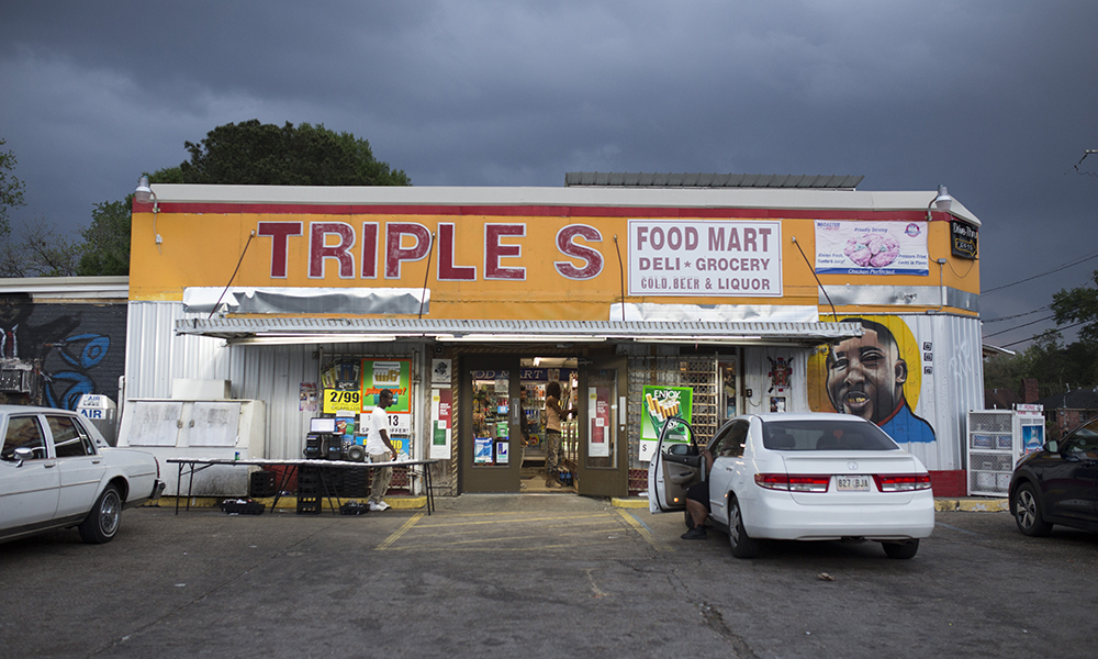 Triple S Food mart, Baton Rouge, Louisiana, white cars, murals, advertisements