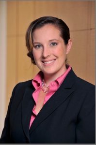 Wende Nichols-Julien (headshot), CEO of CASA of Los Angeles, smiling in light brown hair, dark jacket, pink blouse.