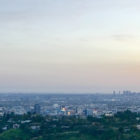 Foster youth: Los Angeles skyline with light blue sky, faintly pink clouds