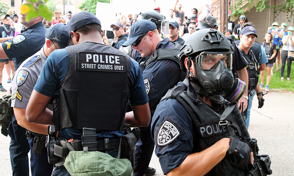 Police officers from Baton Rouge Police Department, police officer with gas mask, police street crimes unit