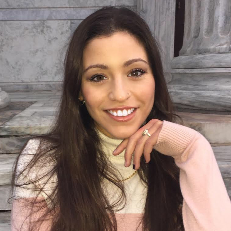 Margaret Goldman (headshot), University of Miami student, intern at The Motivational Edge; smiling young woman with long brown hair, pink and white turtleneck.