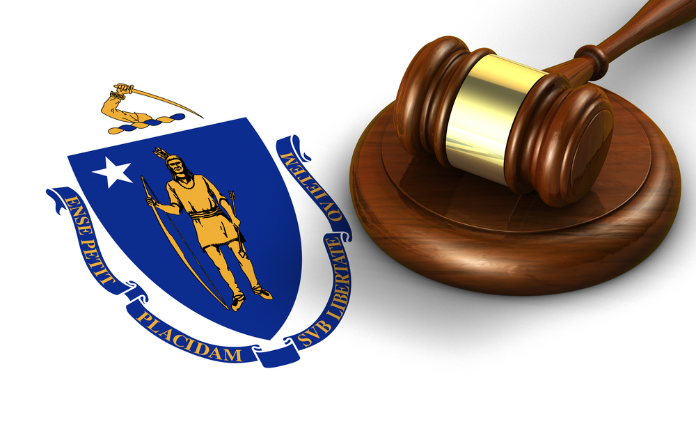Massachusetts: Massachusetts US state law, code, legal system and justice concept with a 3d render of a gavel on the Massachusetts flag on background.