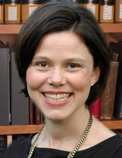 prevention: Cara Drinan (headshot), law professor at Catholic University of America’s Columbus School of Law, smiling woman wearing necklace, earrings, black top