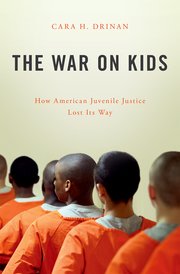 prevention: Cover of book The War on Kids, beige with photo of boys in orange uniforms lined up, seen from back.