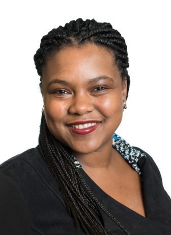 immigrants: Kisha Bird (headshot), director of youth policy at Center for Law and Social Policy, project director for Campaign for Youth, smiling woman with long braids, dark outfit.