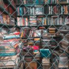 Education: Stack of book blurred in the jail