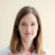 dual system youth: Carly B. Dierkhising (headshot), assistant professor at Cal State LA, young woman with light brown shoulder-length hair, light blue top.