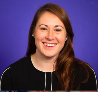 Jesse Kelley (headshot), criminal justice policy analyst at R Street Institute, smiling woman with long brown hair, earrings, black top.