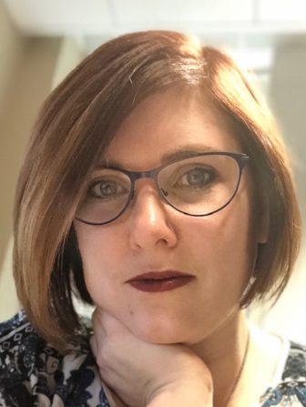 diversion: Courtney Porter (headshot), director of research and development for Fairfax County’s Juvenile and Domestic Relations District Court, woman with light brown hair, glasses.