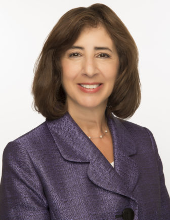 Connecticut: Diane Sierpina (headshot), smiling woman with shoulder-length brown hair, necklace, blue suit