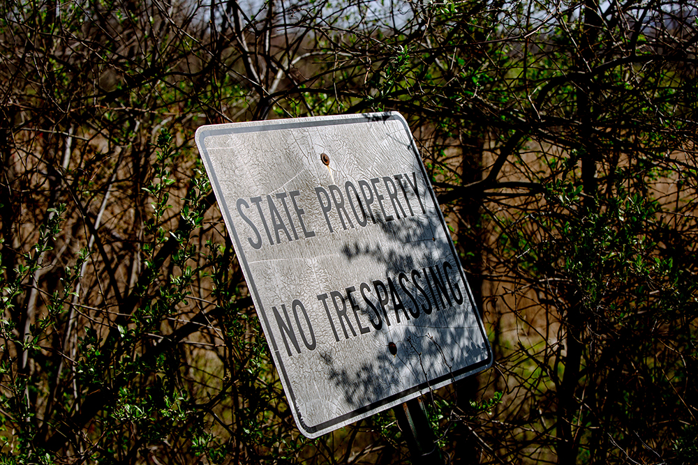Connecticut: Sign at fence says state property no trespassing