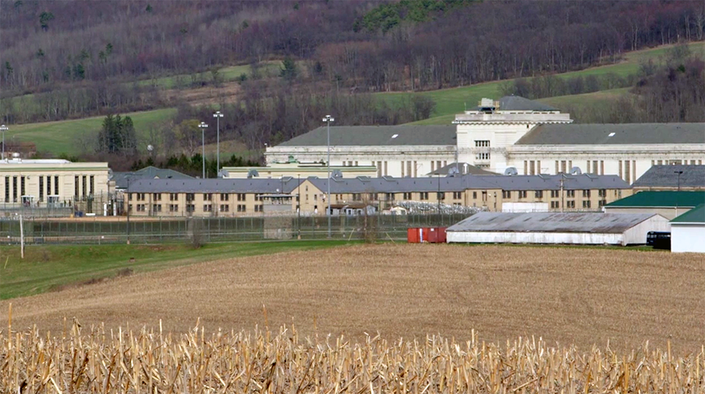 Pennsylvania: Complex of buildings seen across field