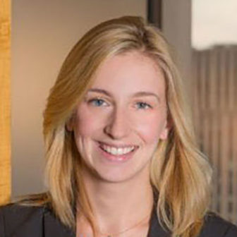 planning: Megan Quattlebaum (headshot), director of Council of State Governments Justice Center, smiling woman with long blonde hair, black jacket, blue top