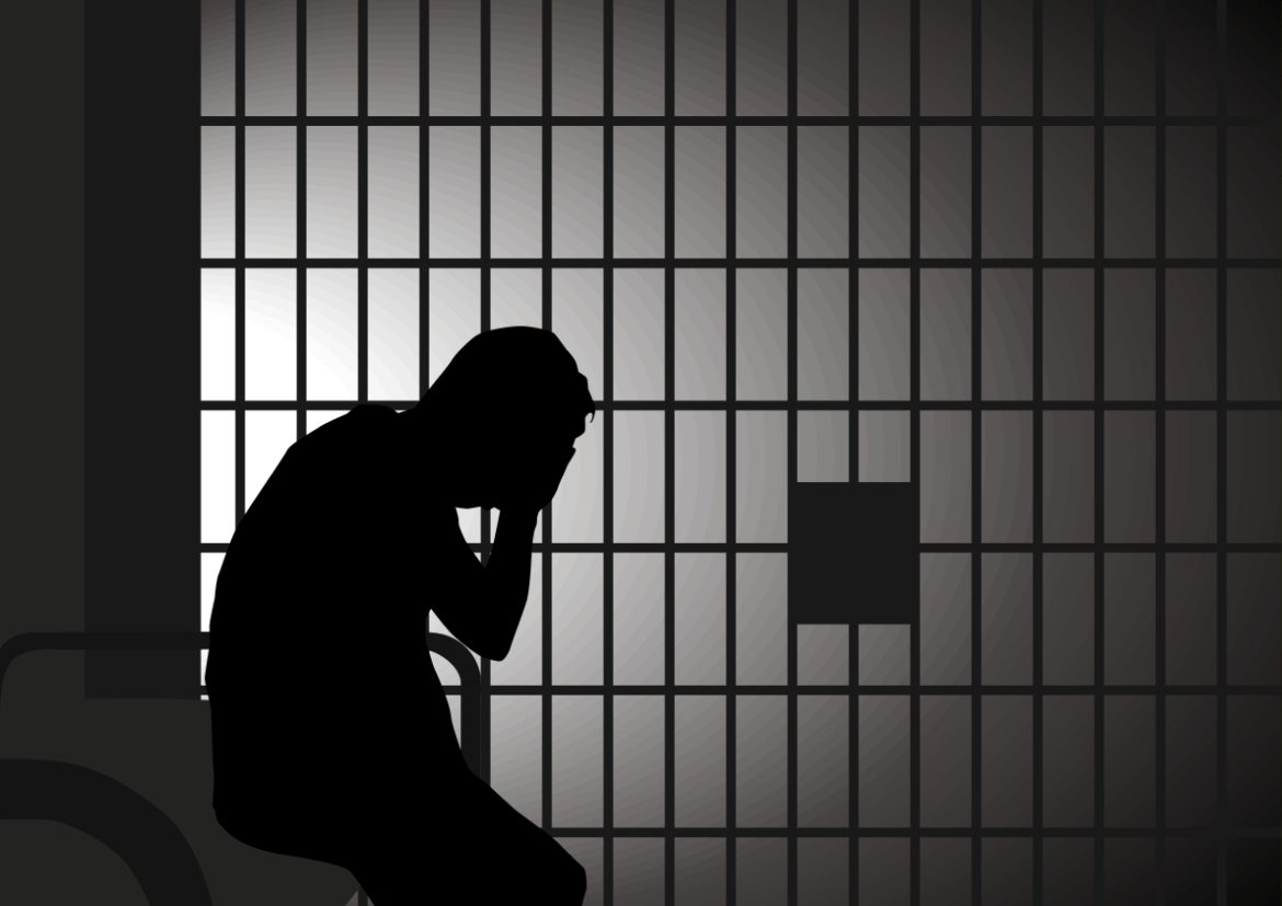 clemency: Vector illustration of a man in jail