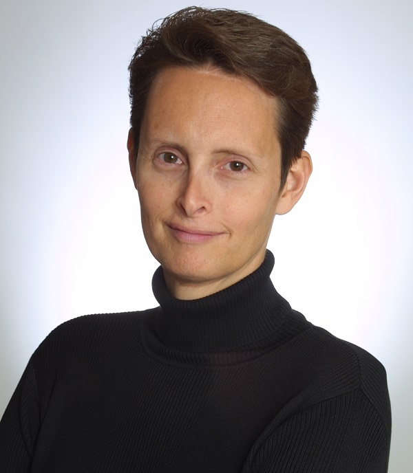 gender norms: Riki Wilchins (headshot), executive director of TrueChild, woman with short brown hair, black turtleneck, arms folded
