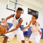 community-based alternatives: Male High School Basketball Team Playing Game