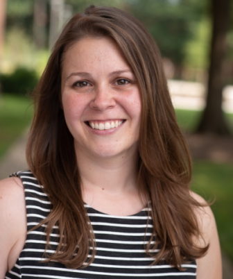 Erika Fountain (headshot), assistant professor of psychology at University of Maryland, smiling woman with long brown hair, black and white tank top