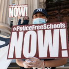 police: Protesters hold signs that say police-free schools now
