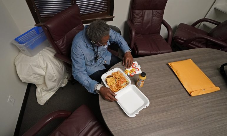 Henry Montgomery freed: older black man enjoying fast food