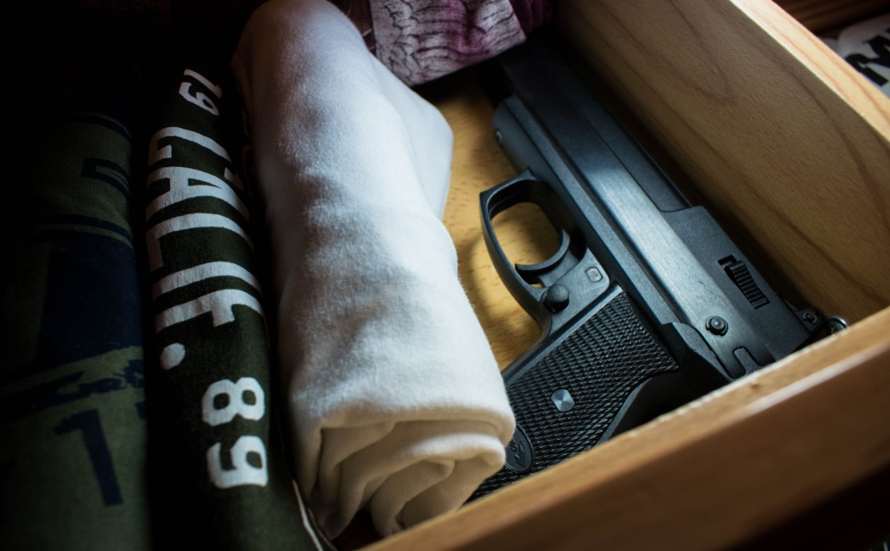 gun suicides among youth report: gun hidden in clothes drawer