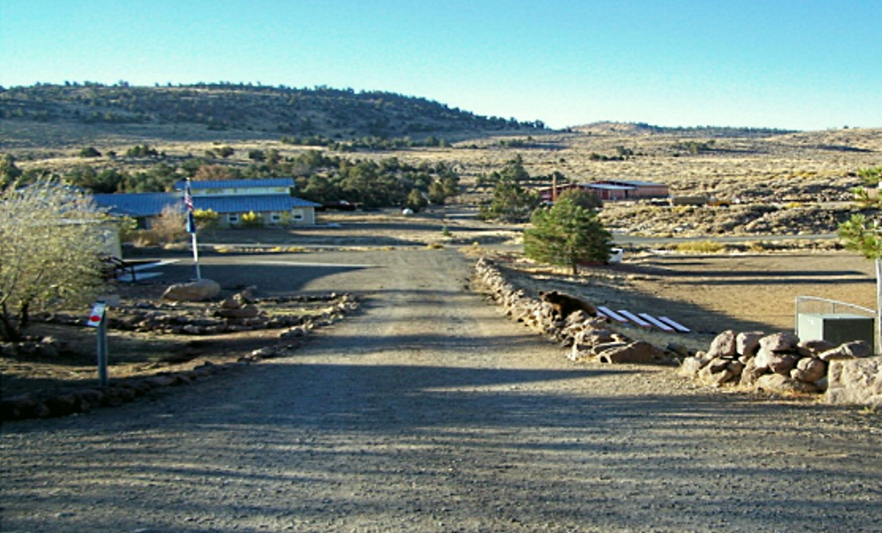 China Springs Youth Camp entrance and buildings in a desert landscape