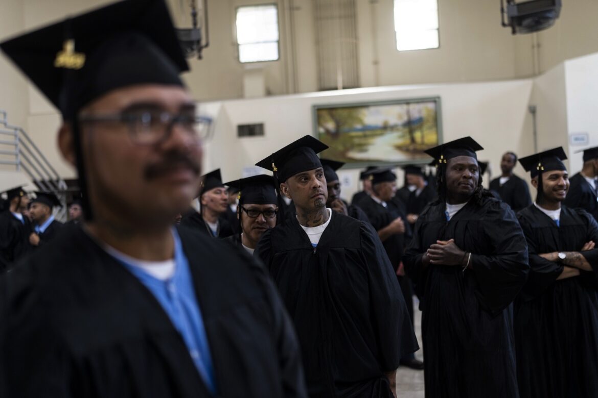 Free college for more prisoners: group of men in graduation garb looking off to the right