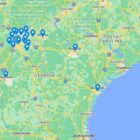 Georgia school violence map: Map of Georgia, US, and some surrounding east coast area in greens and yellows, next to light blue Atlantic Ocean, with darker blue map pins on locations of school violence incidents